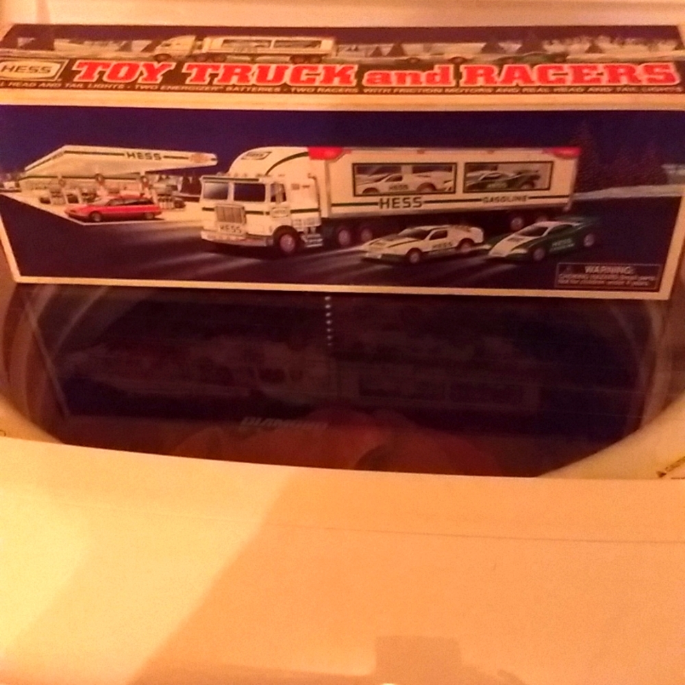 New inbox Hess 1997 toy truck and racers.